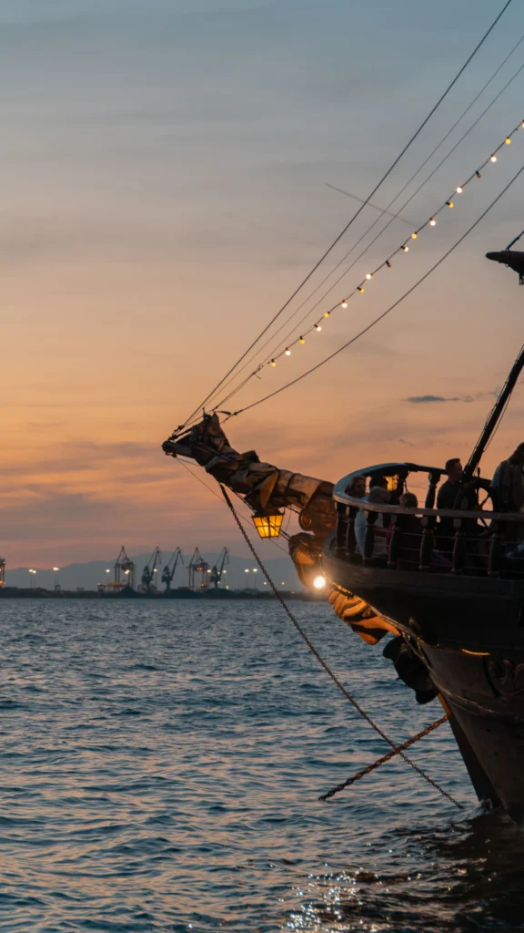 Old sailing ship moored at dusk