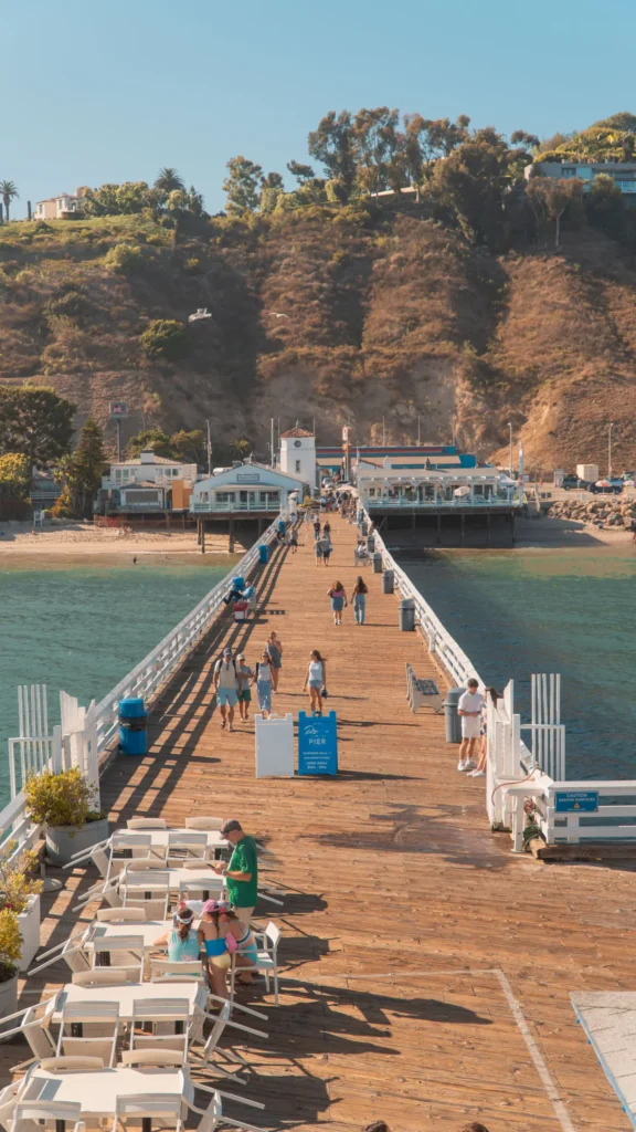 Long wooden pier stretching over the sea